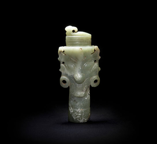 early 11th century – 771 bc)       玉獠牙神人头像 西周 (约公元